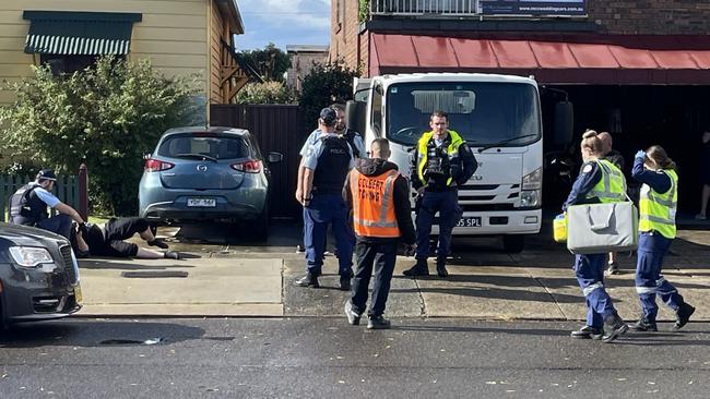 Paramedics arrive at the scene to assess the man, before he was taken to St George Hospital for mandatory testing. Picture: The Daily Telegraph