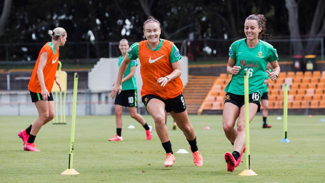 Caitlin Foord, centre, and the Matildas train in Sydney ahead of their Olympic qualifiers