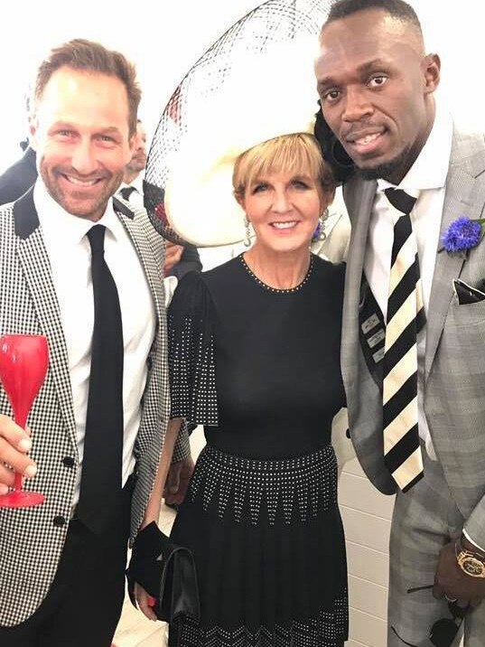 Mr Burbank with Julie Bishop and Usain Bolt at the Melbourne Cup.