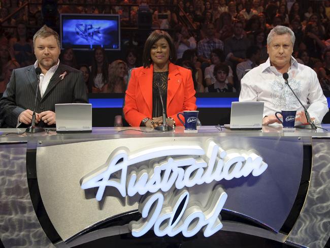 Former Australian Idol judges Kyle Sandilands (left), Marcia Hines and Ian 'Dicko' Dickson. The show was one of the first reality talent programs on Australian TV.