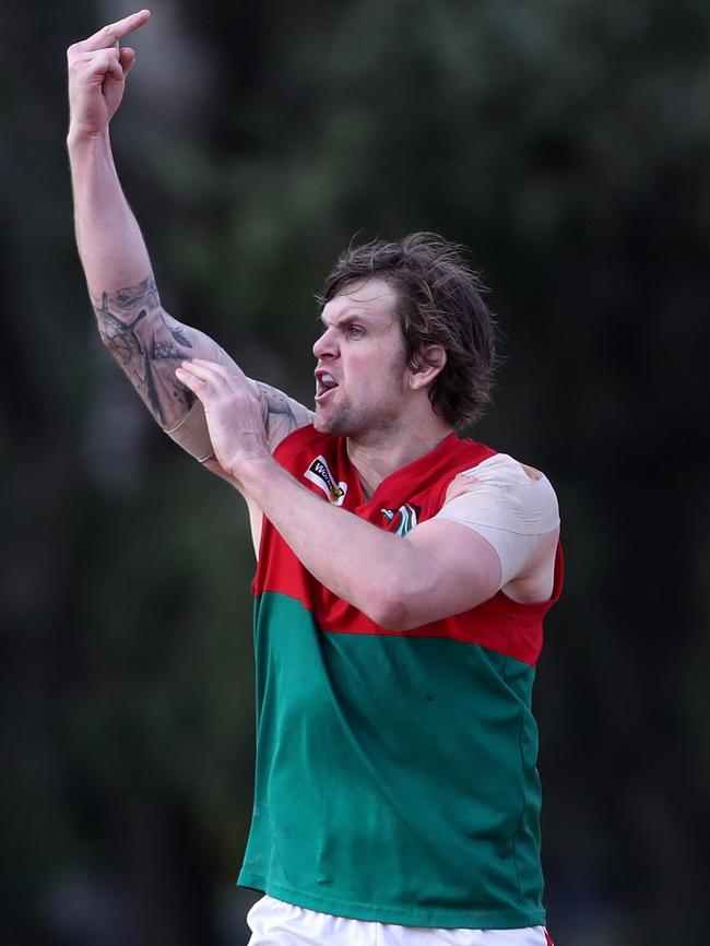 Tim Bongetti of Pines salutes the Chelsea bench after goaling in the final term.