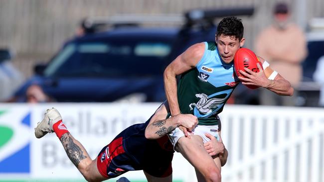 BFNL - Portarlington v Geelong Amateurs.  Geelong Amateurs Tom Gribble tackled by Port's Nick Lane.   Picture Mike Dugdale
