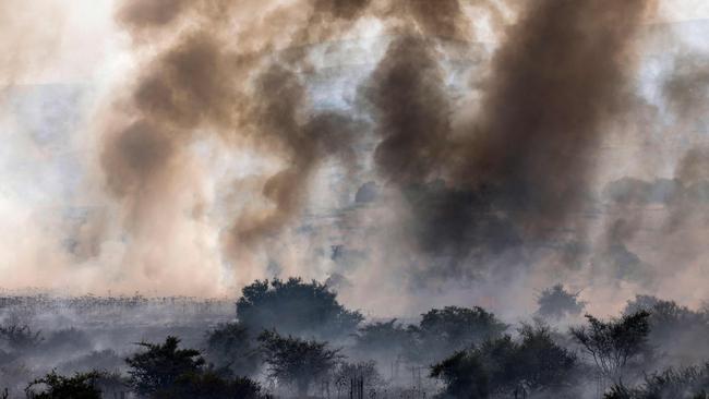 Smoke plumes rise from a fire in the Golan Heights caused by rockets launched from southern Lebanon. Picture: AFP.