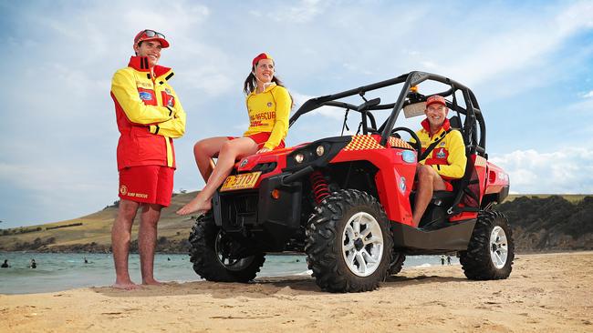 Clifton Beach lifesavers including Zia Mitchelmore, 16, of Lauderdale, (centre) and Simon Kay, 55, of Clifton Beach, (right) with their new Can-Am Commander. Picture: SAM ROSEWARNE