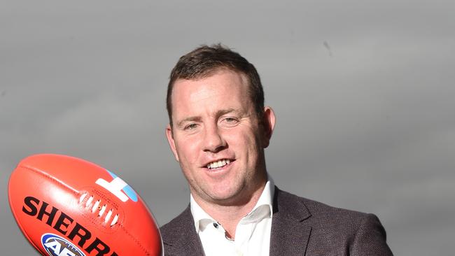 GEELONG premiership and former Greater Western Sydney star Steve Johnson with unveil of the Sherrin to be used in Saturday's AFL Grand Final. Picture: Tony Gough