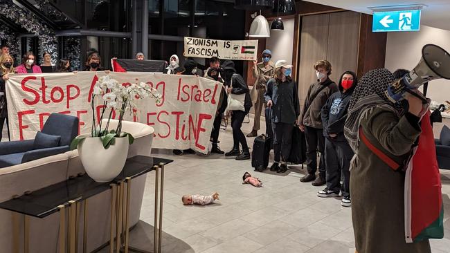 Pro-Palestinian activists ambushed visiting friends and families of Israeli hostages at the Melbourne hotel they were staying at.