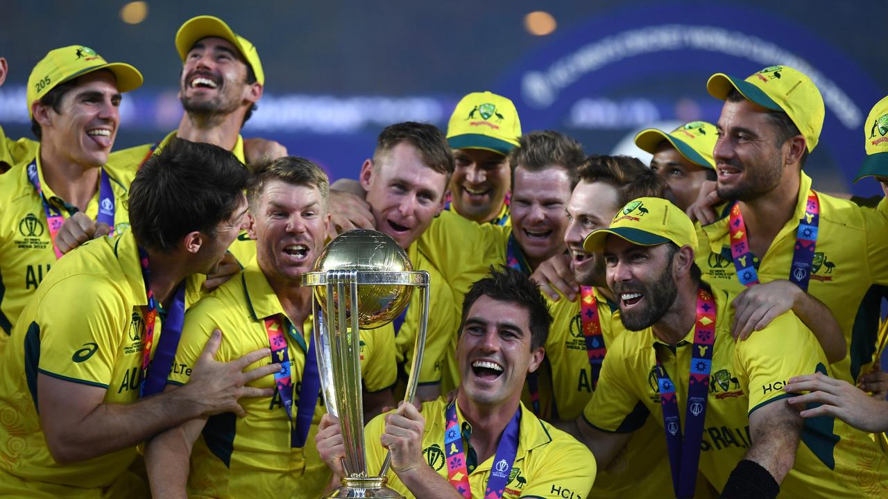 AHMEDABAD, INDIA - NOVEMBER 19: Pat Cummins of Australia lifts the ICC Men's Cricket World Cup Trophy following the ICC Men's Cricket World Cup India 2023 Final between India and Australia at Narendra Modi Stadium on November 19, 2023 in Ahmedabad, India. (Photo by Gareth Copley/Getty Images)