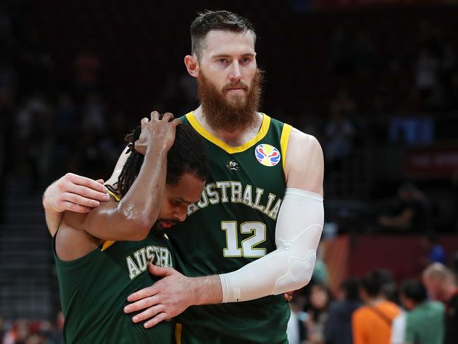 BEIJING, CHINA - SEPTEMBER 13:  Aron Baynes with Patty Mills of Australia reacts after lose the game against Spain during the semi-finals of 2019 FIBA World Cup match between Spain and Australia at Beijing Wukesong Sport Arena on September 13, 2019 in Beijing, China.  (Photo by Lintao Zhang/Getty Images)