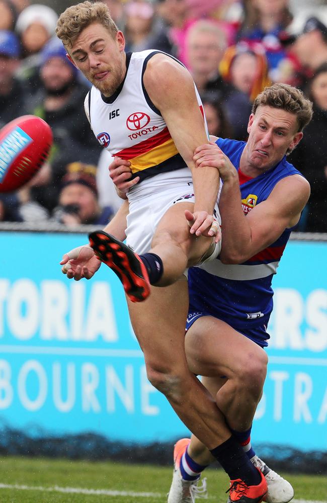 Greenwood is tackled by Aaron Naughton in Ballarat. Picture: Michael Klein.