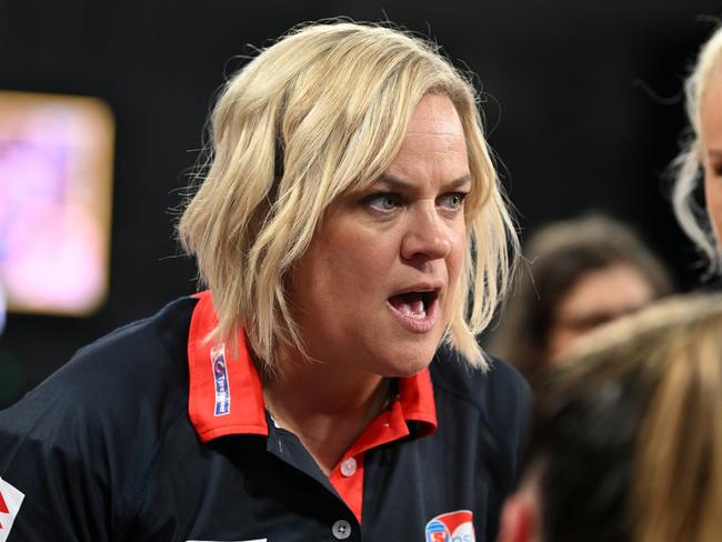 MELBOURNE, AUSTRALIA - MARCH 18: Head coach of the Swifts, Briony Akle speaks to players during the round one Super Netball match between Collingwood Magpies and NSW Swifts at John Cain Arena, on March 18, 2023, in Melbourne, Australia. (Photo by Morgan Hancock/Getty Images)