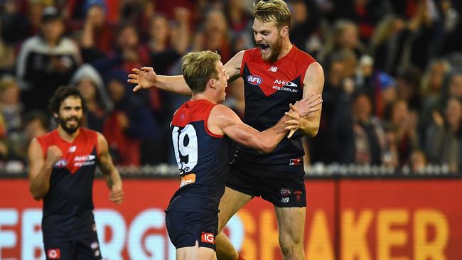 Mitch Hannan is congratulated by Jack Watts after kicking a goal. Picture: Getty Images