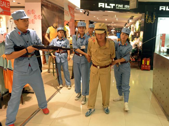 Chinese shopping mall launches anti-Japanese invasion promotional campaign to boost business and remember history Picture: Imaginechina/australscope