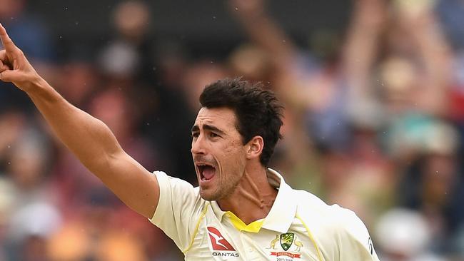 PERTH, AUSTRALIA — DECEMBER 17: Mitchell Starc of Australia celebrates getting the wicket of James Vince of England during day four of the Third Test match during the 2017/18 Ashes Series between Australia and England at WACA on December 17, 2017 in Perth, Australia. (Photo by Quinn Rooney/Getty Images)