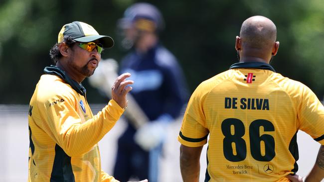 Tillakaratne Dilshan makes a point to Gayan de Silva of Endeavour Hills in the field. Picture: George Sal