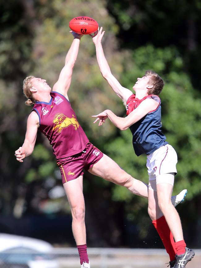 Round 6 QAFL game between reigning premiers Palm Beach Currumbin Lions and Surfers Paradise Demons at Salk Oval. Photo of Jonathan Croad (PBC) and Harris Newton. Gold Coast 11th May, 2019 AAP Image/Richard Gosling