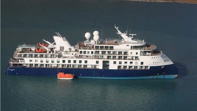 The Ocean Explorer has run aground off Greenland. About 90 of the 200 passengers on board are Australian. Picture: Facebook / Joint Arctic Command