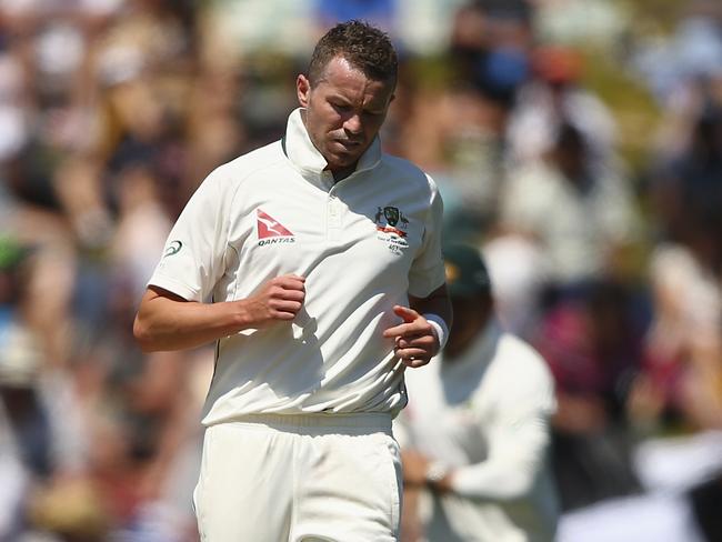 Peter Siddle pulls up short after a delivery.