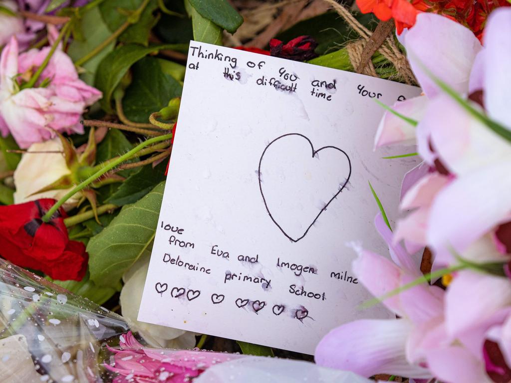 Mourners pay tribute to the children who died after gust of wind swept away a jumping castle at Hillcrest Primary School Devonport Tasmania. Picture: Jason Edwards