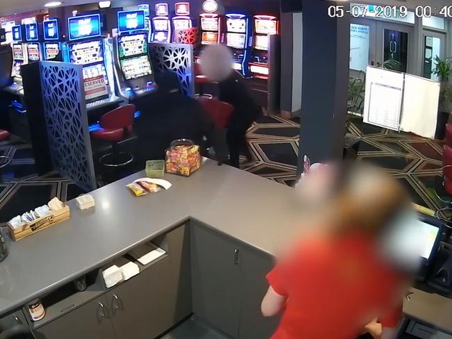 A machete-wielding robber holds staff at ransom at Mermaid Beach Tavern on the Gold Coast in July 2019. Picture: Queensland Police