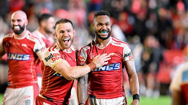 Hamiso Tabuai-Fidow and Euan Aitken of the Dolphins celebrate victory