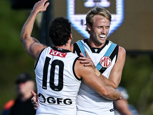 MT BARKER, AUSTRALIA - FEBRUARY 21: Jack Lukosius of the Power celebrates a goal with Travis Boak of the Power during the AFL practice match between Adelaide Crows and Port Adelaide Power at Mt Barker Summit Sport and Recreation Ground on February 21, 2025 in Mt Barker, Australia. (Photo by Mark Brake/Getty Images)