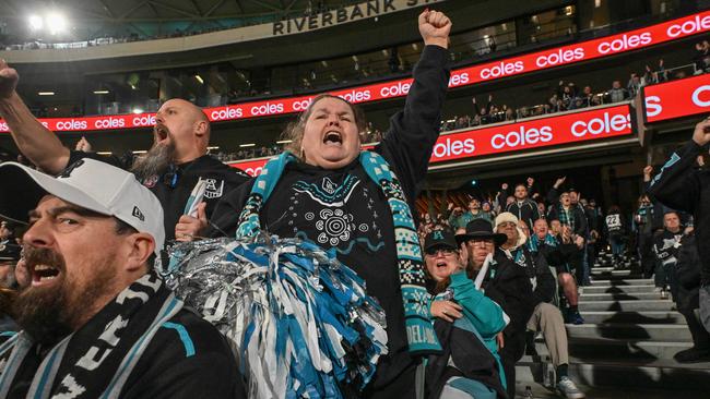 Port fans cheer after a big win.. Picture: Brenton Edwards