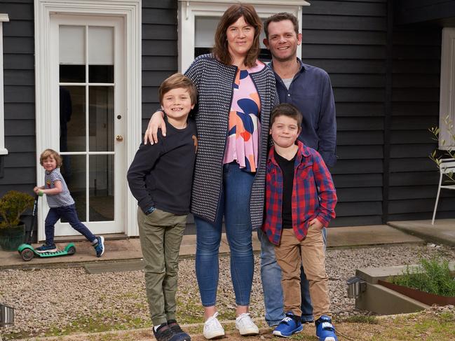 Kate and Rob Cooper pose with their sons Ned, 8, George, 6, and Humphrey, 4 at their AirBnb property in Red Hill, Friday 27th September 2019. Both parents were privately educated but are struggling to get by each month on the income of two working parents plus an AirBnB and Kate's networking marketing business. Photo Stefan Postles.