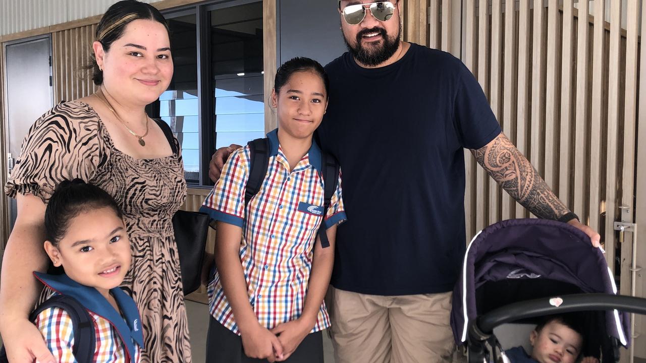 The first day of school at Queensland’s newest primary school Scenic Shores State School for Eva Araipu, 6, pictured with her big sister Elizabeth, 11, family mum Therese and dad Ariki and baby Abigail. Pictures; JUDITH KERR