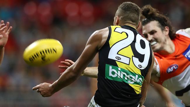 Harry Perryman gets the tip of his fingers to Shai Bolton’s potential matchwinner for the Tigers against GWS in Round 9. Picture: Getty Images