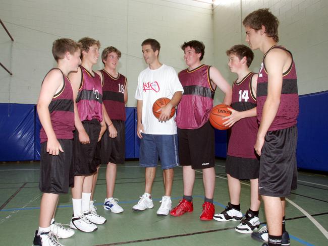 Hobart Chargers player Anthony Stewart coaches Hutchins students from left Lewis Franks, Will Fehlberg, Courtney Winter, Anthony Stewart, Nick Cleary, Jade Browning and Sam Gumley