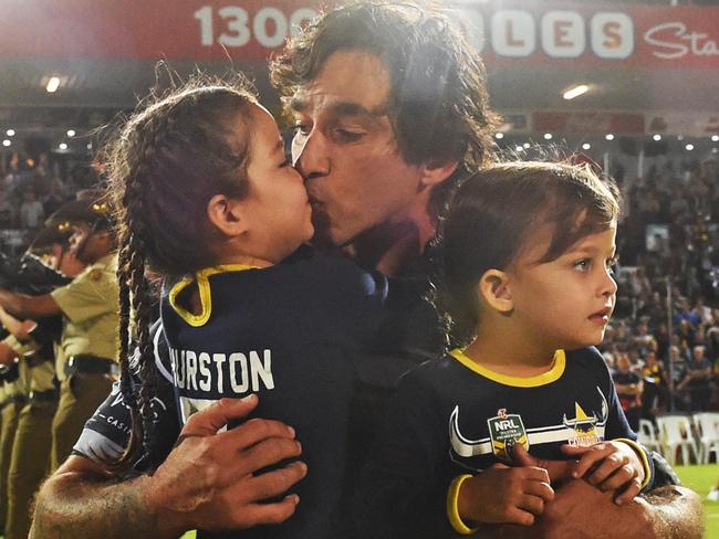 North Queensland Cowboys v Parramatta Eels from 1300 Smiles Stadium, Townsville.  Cowboys Johnathan Thurston runs out into the field with daughters Frankie and Charlie. Picture: Zak Simmonds