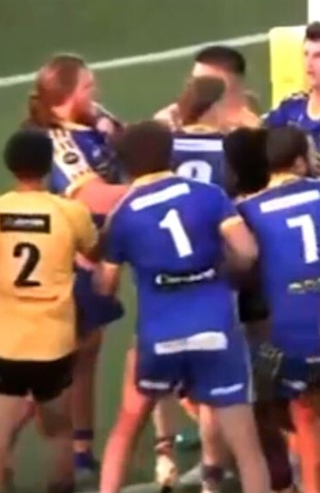 Players remonstrate with Keegan McKinnon (left, in blue with long hair) shortly after the alleged punch. Picture: BarTV Sports