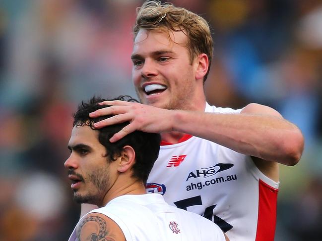 PERTH, AUSTRALIA - JULY 23: Jack Watts and Jeff Garlett of the Demons celebrate a goal during the round 18 AFL match between the West Coast Eagles and the Melbourne Demons at Domain Stadium on July 23, 2016 in Perth, Australia. (Photo by Paul Kane/Getty Images)