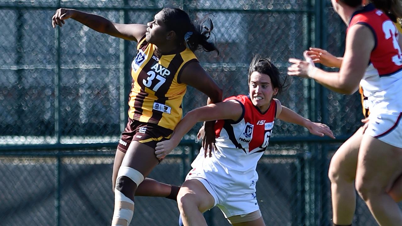 VFLW: Box Hill’s Ashanti Bush knocks the ball forward against Darebin Falcons. Picture: Steve Tanner