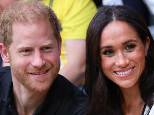 DUESSELDORF, GERMANY - SEPTEMBER 13: Prince Harry, Duke of Sussex and Meghan, Duchess of Sussex pose for a photograph as they attend the Wheelchair Basketball preliminary match between Ukraine and Australia during day four of the Invictus Games Düsseldorf 2023 on September 13, 2023 in Duesseldorf, Germany. (Photo by Chris Jackson/Getty Images for the Invictus Games Foundation)