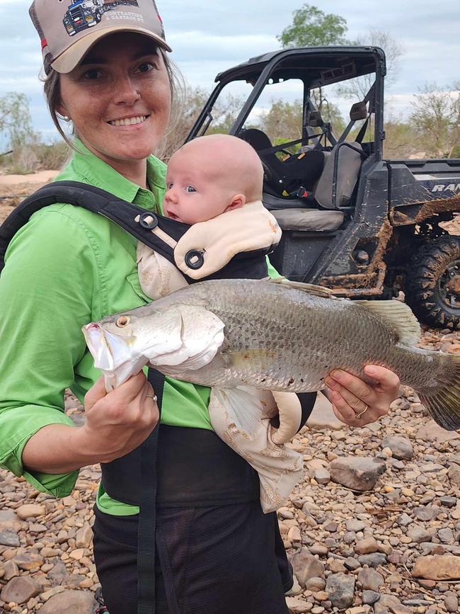 Baby Jesse with his first barramundi. Picture: Supplied