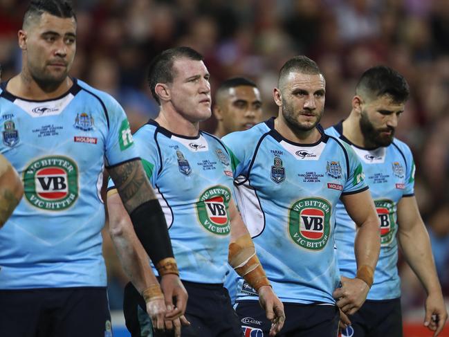 BRISBANE, AUSTRALIA - JUNE 22: Andrew Fifita, Paul Gallen, Robbie Farah and Josh Mansour of the Blues look dejected after a try during game two of the State Of Origin series between the Queensland Maroons and the New South Wales Blues at Suncorp Stadium on June 22, 2016 in Brisbane, Australia. (Photo by Mark Kolbe/Getty Images)