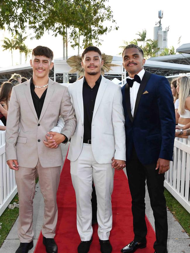 Kaden Humphris, Tyrell Hopkins, and Brooklenn Mundraby at the 2023 Caloundra State High School Year 12 formal. Picture: Patrick Woods.