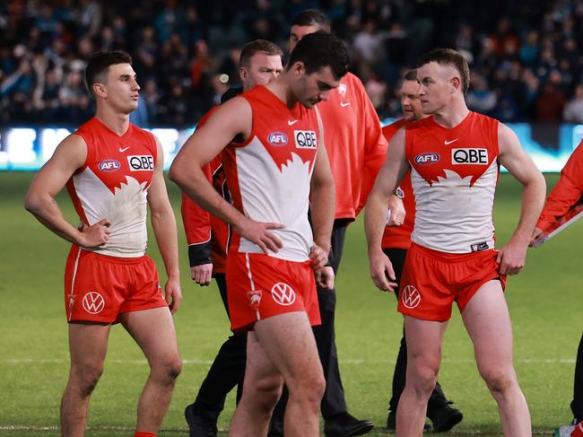 ADELAIDE, AUSTRALIA - AUG 03: The Swans after their loss during the 2024 AFL Round 21 match between the Port Adelaide Power and the Sydney Swans at Adelaide Oval on August 03, 2024 in Adelaide, Australia. (Photo by James Elsby/AFL Photos via Getty Images)