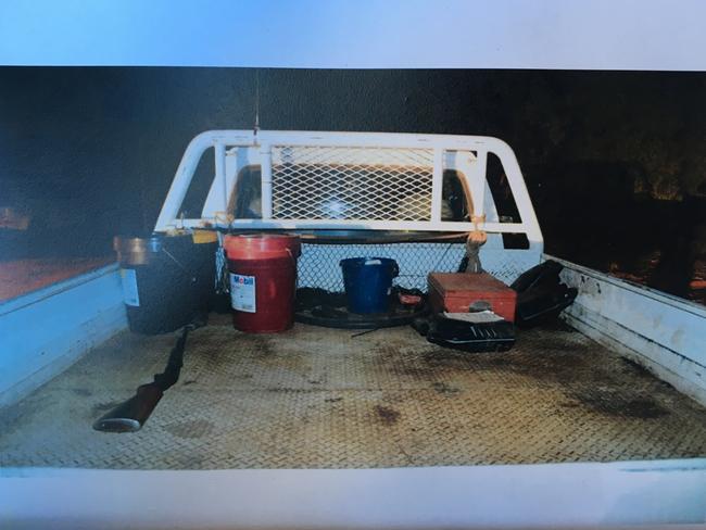 Photos of the back of Ian Robert Turnbull's ute where he put the .22 caliber pump action browning rifle he used to shoot Glen Turner.