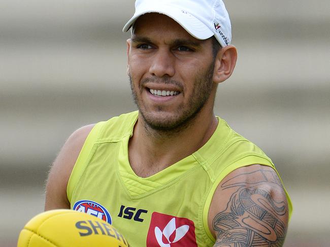 SPORT - The Fremantle Dockers train ahead of their season opener on Sunday. Photo by Daniel Wilkins. PICTURED- Harley Bennell walks the boundary during training