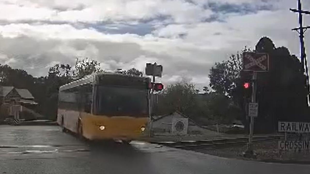 Adelaide Metro bus driver stood down after running red light at Nairne train  crossing | The Advertiser