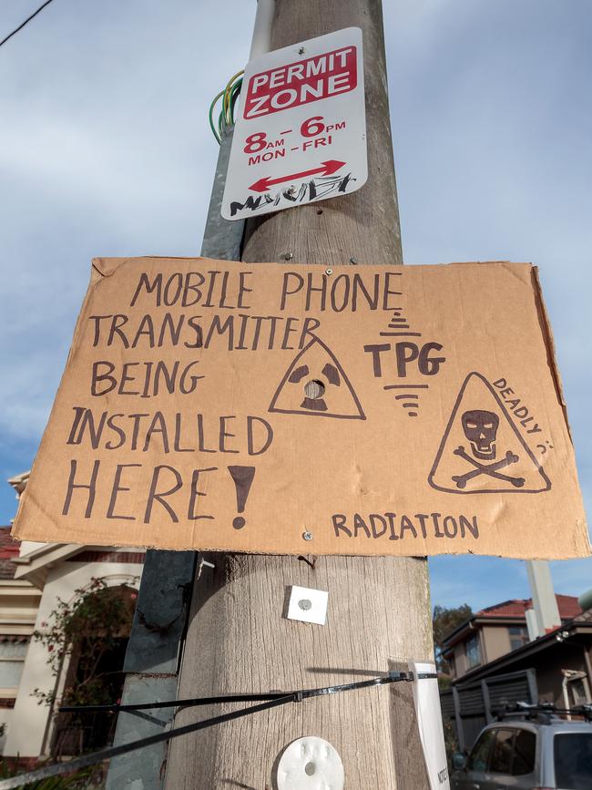 Angry residents in Camden Rd, Hawthorn protesting TPG’s plans for radio communication works in their street. Picture: Mark Dadswell