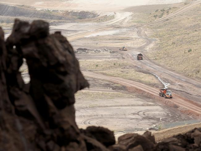 Trucks transport old coal at Hazelwood. Picture: Robert Cianflone/Getty Images