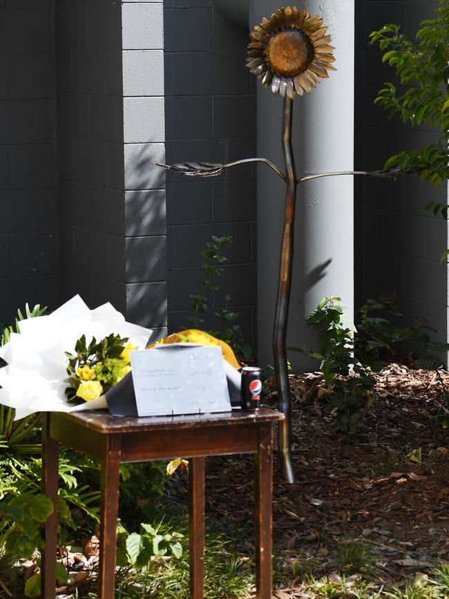 Unveiling the plaque for Olivia's Memorial sculpture.