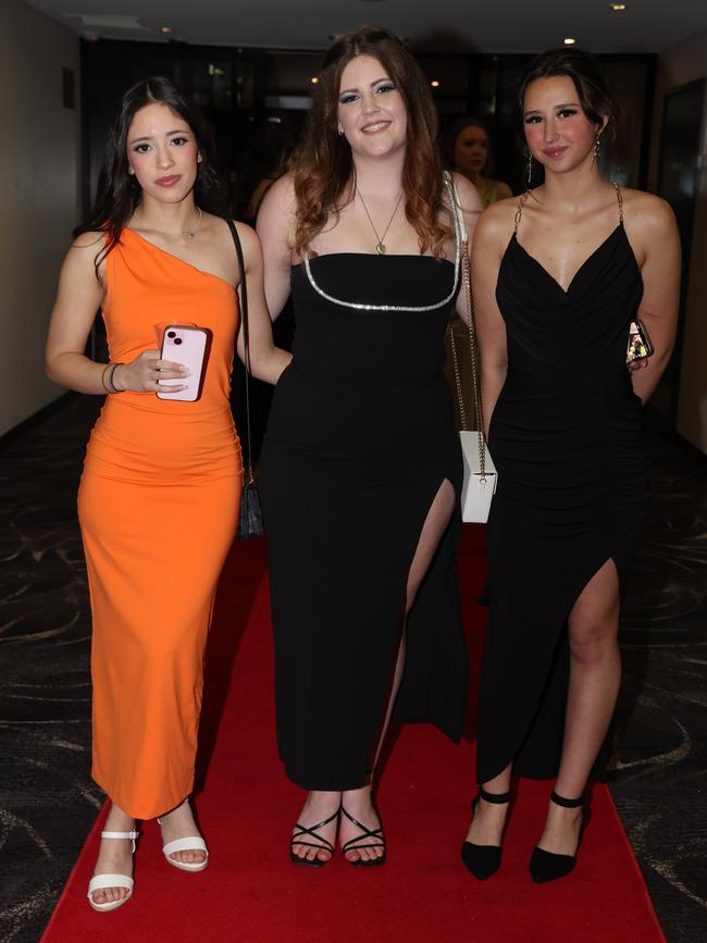 MELBOURNE, AUSTRALIA – JUNE 14 2024 Vanessa Stacy, Breanna Tatterson and Jessica Mangion attend the Lowanna College Senior Formal 2024 at the Moe Racing Club Picture: Brendan Beckett