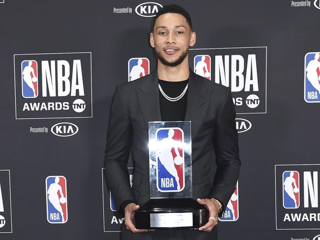 Ben Simmons, of the Philadelphia 76ers, poses in the press room with the rookie of the year award at the NBA Awards on Monday, June 25, 2018, at the Barker Hangar in Santa Monica, Calif. (Photo by Richard Shotwell/Invision/AP)