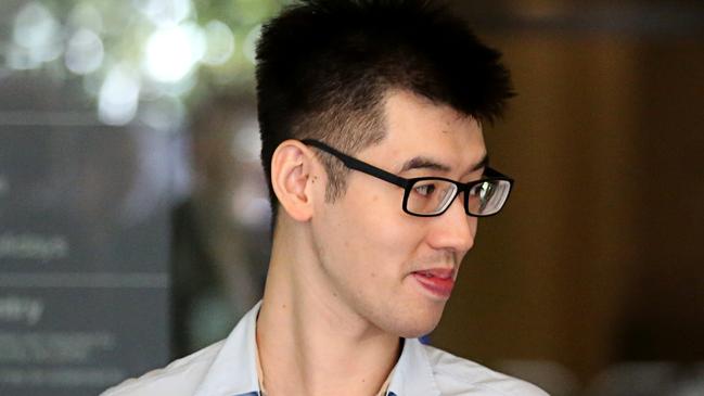 Yi Zheng leaves the Downing Centre Courts in Sydney, today. Picture: AAP