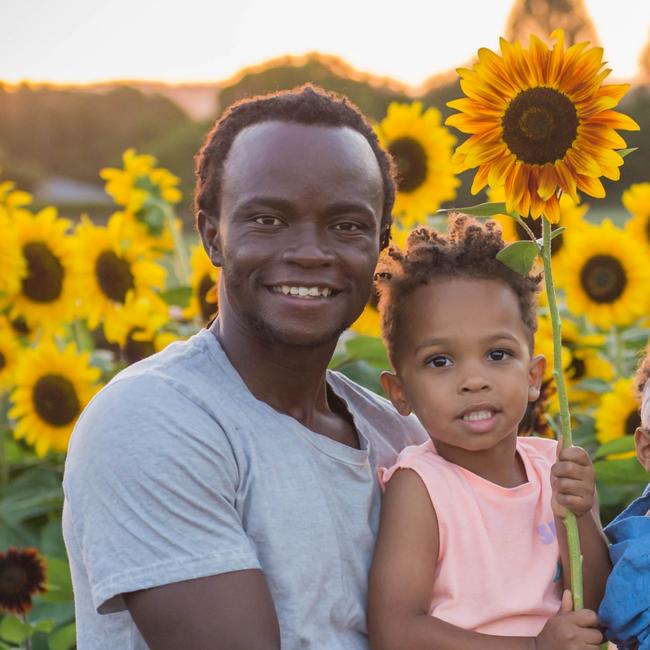 Fred with son Malachi, 3. Picture: @wallflower.farm