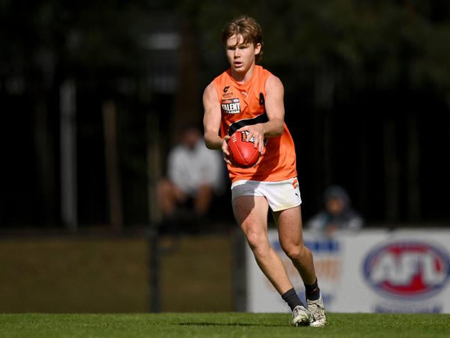 Harvey Thomas of the Giants kicks the ball during the round one Coates Talent League Boys match between Northern Knights and GWS Giants Academy at Highgate Reserve on March 25, 2023 in Melbourne, Australia. Picture: Morgan Hancock/AFL Photos.